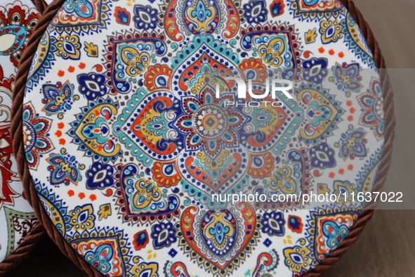 Uyghur handicrafts coasters are in Hami, Xinjiang province, China, on October 4, 2024. 