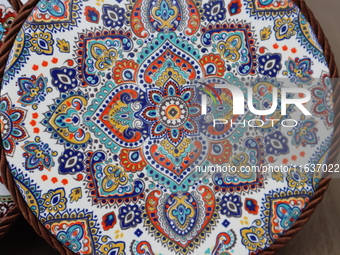 Uyghur handicrafts coasters are in Hami, Xinjiang province, China, on October 4, 2024. (