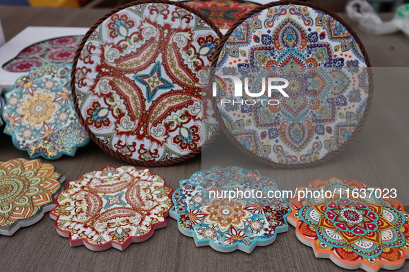 Uyghur handicrafts coasters are in Hami, Xinjiang province, China, on October 4, 2024. 