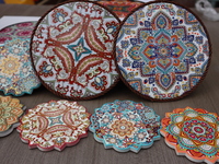 Uyghur handicrafts coasters are in Hami, Xinjiang province, China, on October 4, 2024. (