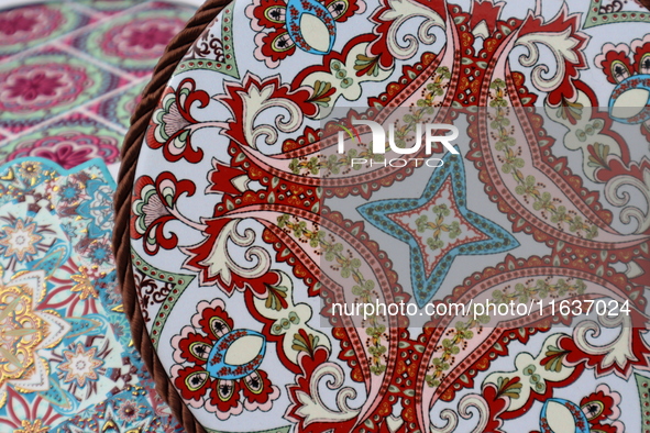 Uyghur handicrafts coasters are in Hami, Xinjiang province, China, on October 4, 2024. 