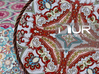 Uyghur handicrafts coasters are in Hami, Xinjiang province, China, on October 4, 2024. (