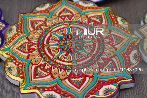 Uyghur handicrafts coasters are in Hami, Xinjiang province, China, on October 4, 2024. 