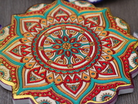 Uyghur handicrafts coasters are in Hami, Xinjiang province, China, on October 4, 2024. (