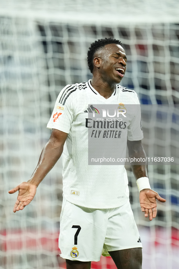 Vinicius Junior left winger of Real Madrid and Brazil protest to referee during the La Liga match between Real Madrid CF and Deportivo Alavé...