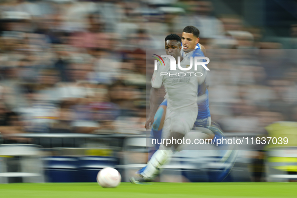 Vinicius Junior left winger of Real Madrid and Brazil in action during the La Liga match between Real Madrid CF and Deportivo Alavés at Esta...