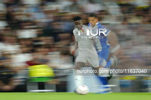 Vinicius Junior left winger of Real Madrid and Brazil in action during the La Liga match between Real Madrid CF and Deportivo Alavés at Esta...