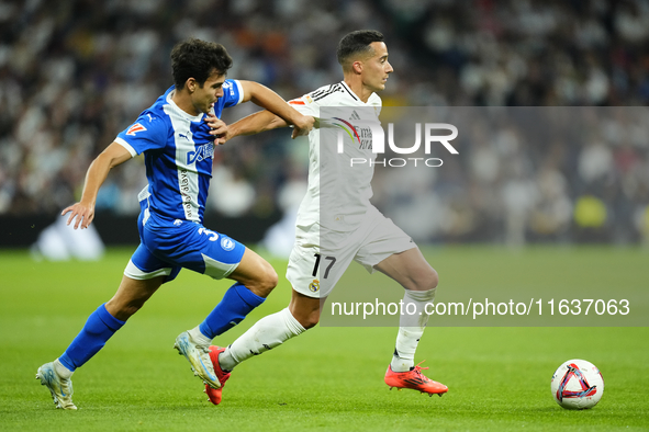 Lucas Vazquez right winger of Real Madrid and Spain and Manu Sanchez left-back of Alaves and Spain compete for the ball during the La Liga m...