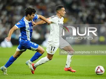 Lucas Vazquez right winger of Real Madrid and Spain and Manu Sanchez left-back of Alaves and Spain compete for the ball during the La Liga m...