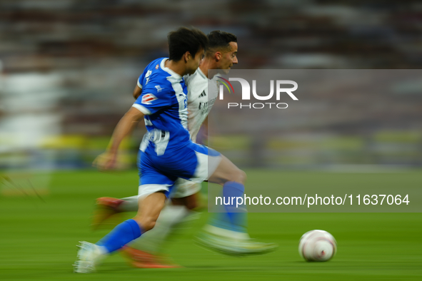 Lucas Vazquez right winger of Real Madrid and Spain and Manu Sanchez left-back of Alaves and Spain compete for the ball during the La Liga m...