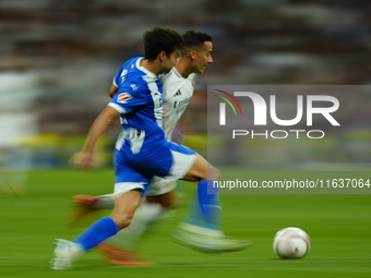 Lucas Vazquez right winger of Real Madrid and Spain and Manu Sanchez left-back of Alaves and Spain compete for the ball during the La Liga m...