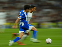 Lucas Vazquez right winger of Real Madrid and Spain and Manu Sanchez left-back of Alaves and Spain compete for the ball during the La Liga m...