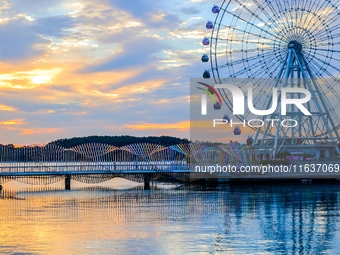 The Rainbow Bridge is seen by Tangdao Bay in the West Coast New Area of Qingdao, Shandong province, China, on October 5, 2024. (