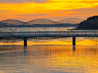 The Rainbow Bridge is seen by Tangdao Bay in the West Coast New Area of Qingdao, Shandong province, China, on October 5, 2024. (