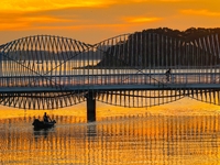 The Rainbow Bridge is seen by Tangdao Bay in the West Coast New Area of Qingdao, Shandong province, China, on October 5, 2024. (