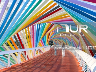 The Rainbow Bridge is seen by Tangdao Bay in the West Coast New Area of Qingdao, Shandong province, China, on October 5, 2024. (