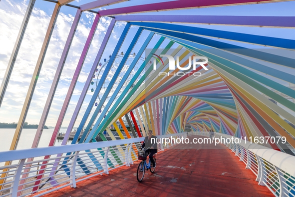 The Rainbow Bridge is seen by Tangdao Bay in the West Coast New Area of Qingdao, Shandong province, China, on October 5, 2024. 