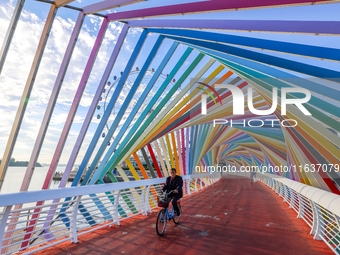 The Rainbow Bridge is seen by Tangdao Bay in the West Coast New Area of Qingdao, Shandong province, China, on October 5, 2024. (