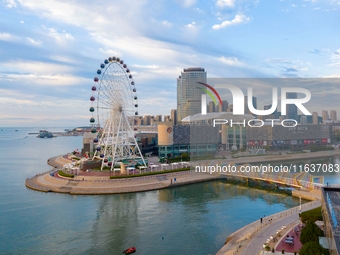 The Rainbow Bridge is seen by Tangdao Bay in the West Coast New Area of Qingdao, Shandong province, China, on October 5, 2024. (