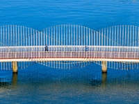 The Rainbow Bridge is seen by Tangdao Bay in the West Coast New Area of Qingdao, Shandong province, China, on October 5, 2024. (