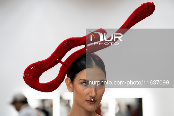 Supermodel Cindy Sirinya Bishop prepares backstage before walking on the runway during Day 3 of Bangkok International Fashion Week at Siam P...