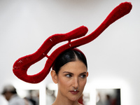 Supermodel Cindy Sirinya Bishop prepares backstage before walking on the runway during Day 3 of Bangkok International Fashion Week at Siam P...