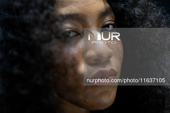 Models wear creations by ISSUE and get ready backstage before walking on the runway during Day 3 of Bangkok International Fashion Week at Si...