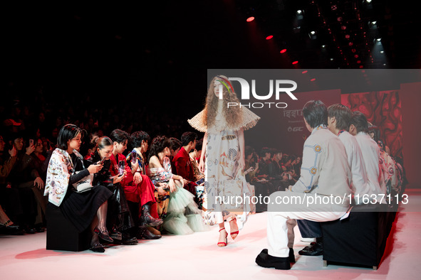 Models showcase creations by ISSUE on the runway on Day 3 of Bangkok International Fashion Week at Siam Paragon in Bangkok, Thailand, on Oct...