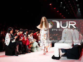 Models showcase creations by ISSUE on the runway on Day 3 of Bangkok International Fashion Week at Siam Paragon in Bangkok, Thailand, on Oct...