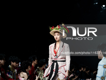 Models showcase creations by ISSUE on the runway on Day 3 of Bangkok International Fashion Week at Siam Paragon in Bangkok, Thailand, on Oct...