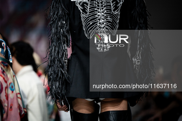 Models showcase creations by ISSUE on the runway on Day 3 of Bangkok International Fashion Week at Siam Paragon in Bangkok, Thailand, on Oct...