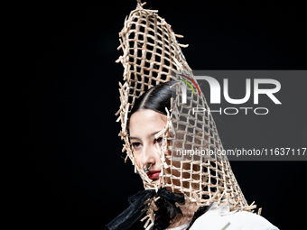 Models showcase creations by ISSUE on the runway on Day 3 of Bangkok International Fashion Week at Siam Paragon in Bangkok, Thailand, on Oct...