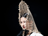 Models showcase creations by ISSUE on the runway on Day 3 of Bangkok International Fashion Week at Siam Paragon in Bangkok, Thailand, on Oct...