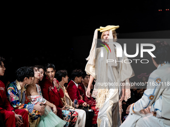 Models showcase creations by ISSUE on the runway on Day 3 of Bangkok International Fashion Week at Siam Paragon in Bangkok, Thailand, on Oct...