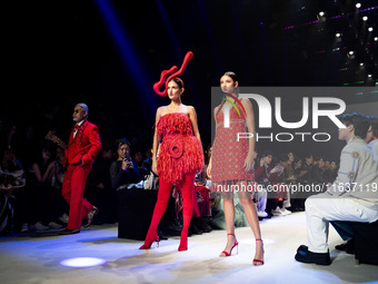 Metinee 'Lukkad' Kingpayom (L) walks the runway in a creation by ISSUE during Day 3 of Bangkok International Fashion Week at Siam Paragon in...