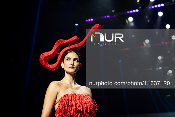 Cindy Sirinya Bishop walks the runway in a creation by ISSUE during Day 3 of Bangkok International Fashion Week at Siam Paragon in Bangkok,...