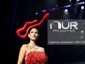 Cindy Sirinya Bishop walks the runway in a creation by ISSUE during Day 3 of Bangkok International Fashion Week at Siam Paragon in Bangkok,...