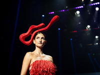 Cindy Sirinya Bishop walks the runway in a creation by ISSUE during Day 3 of Bangkok International Fashion Week at Siam Paragon in Bangkok,...