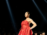 Metinee 'Lukkad' Kingpayom walks the runway in a creation by ISSUE during Day 3 of Bangkok International Fashion Week at Siam Paragon in Ban...