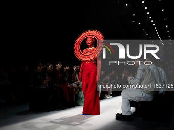 Models showcase creations by ISSUE on the runway on Day 3 of Bangkok International Fashion Week at Siam Paragon in Bangkok, Thailand, on Oct...