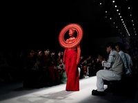 Models showcase creations by ISSUE on the runway on Day 3 of Bangkok International Fashion Week at Siam Paragon in Bangkok, Thailand, on Oct...