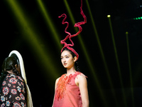 Models showcase creations by ISSUE on the runway on Day 3 of Bangkok International Fashion Week at Siam Paragon in Bangkok, Thailand, on Oct...