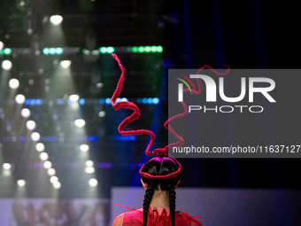 Models showcase creations by ISSUE on the runway on Day 3 of Bangkok International Fashion Week at Siam Paragon in Bangkok, Thailand, on Oct...