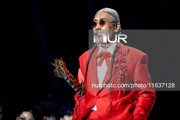 Models showcase creations by ISSUE on the runway on Day 3 of Bangkok International Fashion Week at Siam Paragon in Bangkok, Thailand, on Oct...