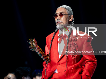 Models showcase creations by ISSUE on the runway on Day 3 of Bangkok International Fashion Week at Siam Paragon in Bangkok, Thailand, on Oct...