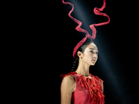 Models showcase creations by ISSUE on the runway on Day 3 of Bangkok International Fashion Week at Siam Paragon in Bangkok, Thailand, on Oct...