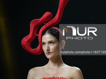 Cindy Sirinya Bishop walks the runway in a creation by ISSUE during Day 3 of Bangkok International Fashion Week at Siam Paragon in Bangkok,...