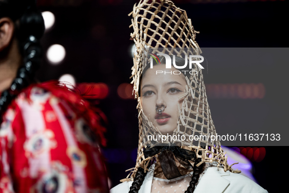 Models showcase creations by ISSUE on the runway on Day 3 of Bangkok International Fashion Week at Siam Paragon in Bangkok, Thailand, on Oct...