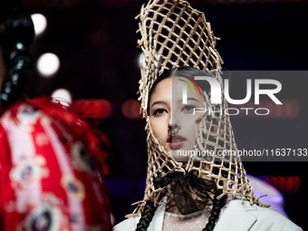 Models showcase creations by ISSUE on the runway on Day 3 of Bangkok International Fashion Week at Siam Paragon in Bangkok, Thailand, on Oct...