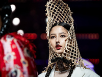 Models showcase creations by ISSUE on the runway on Day 3 of Bangkok International Fashion Week at Siam Paragon in Bangkok, Thailand, on Oct...